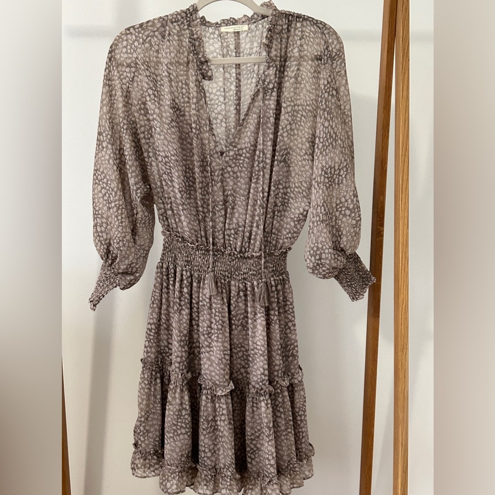 Lovestitch dress. Top part of dress is sheer. There is a slip under the dress.